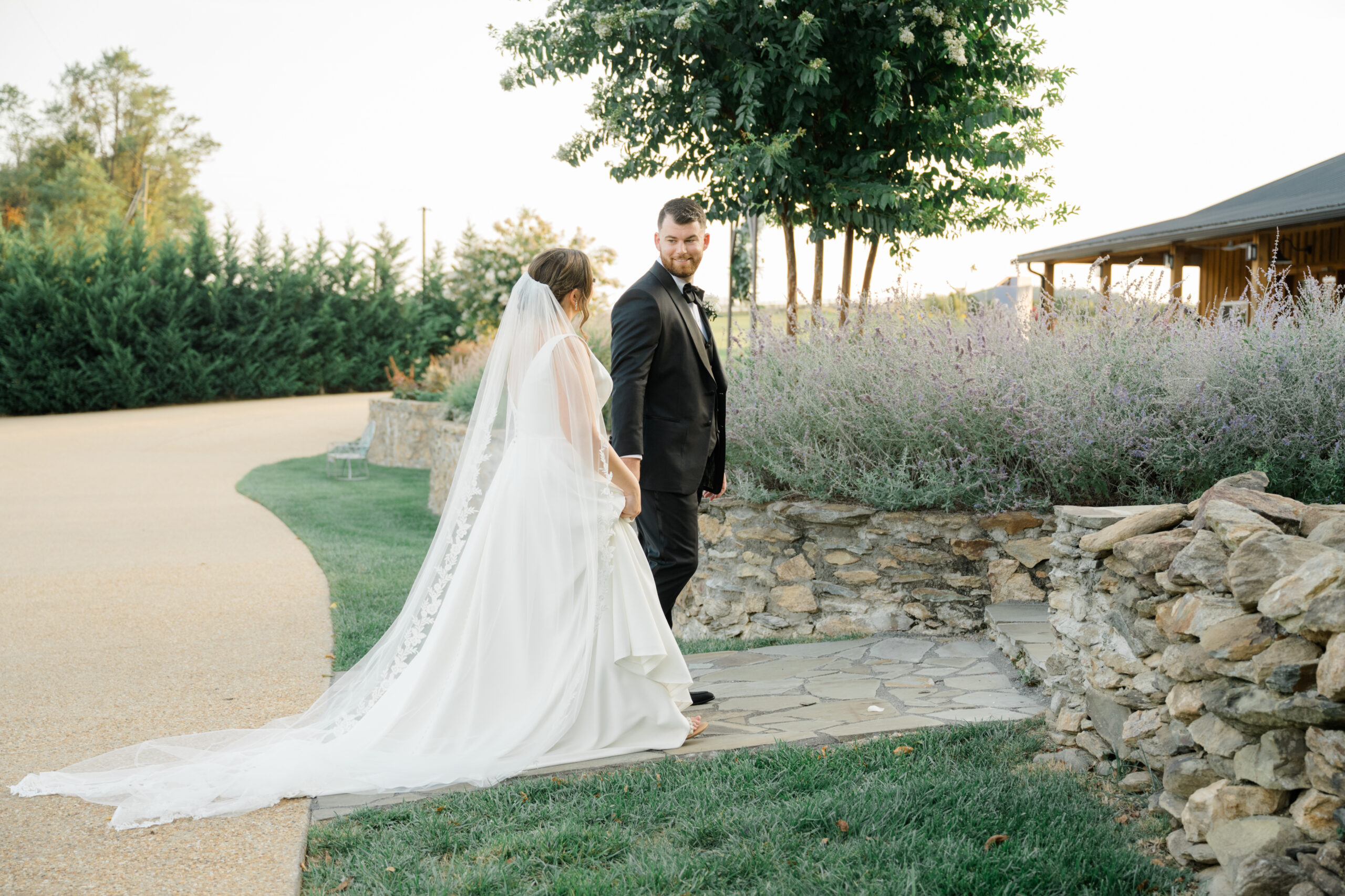 Bride and groom sharing a quiet moment together during portraits with mountain views at Gordon Springs