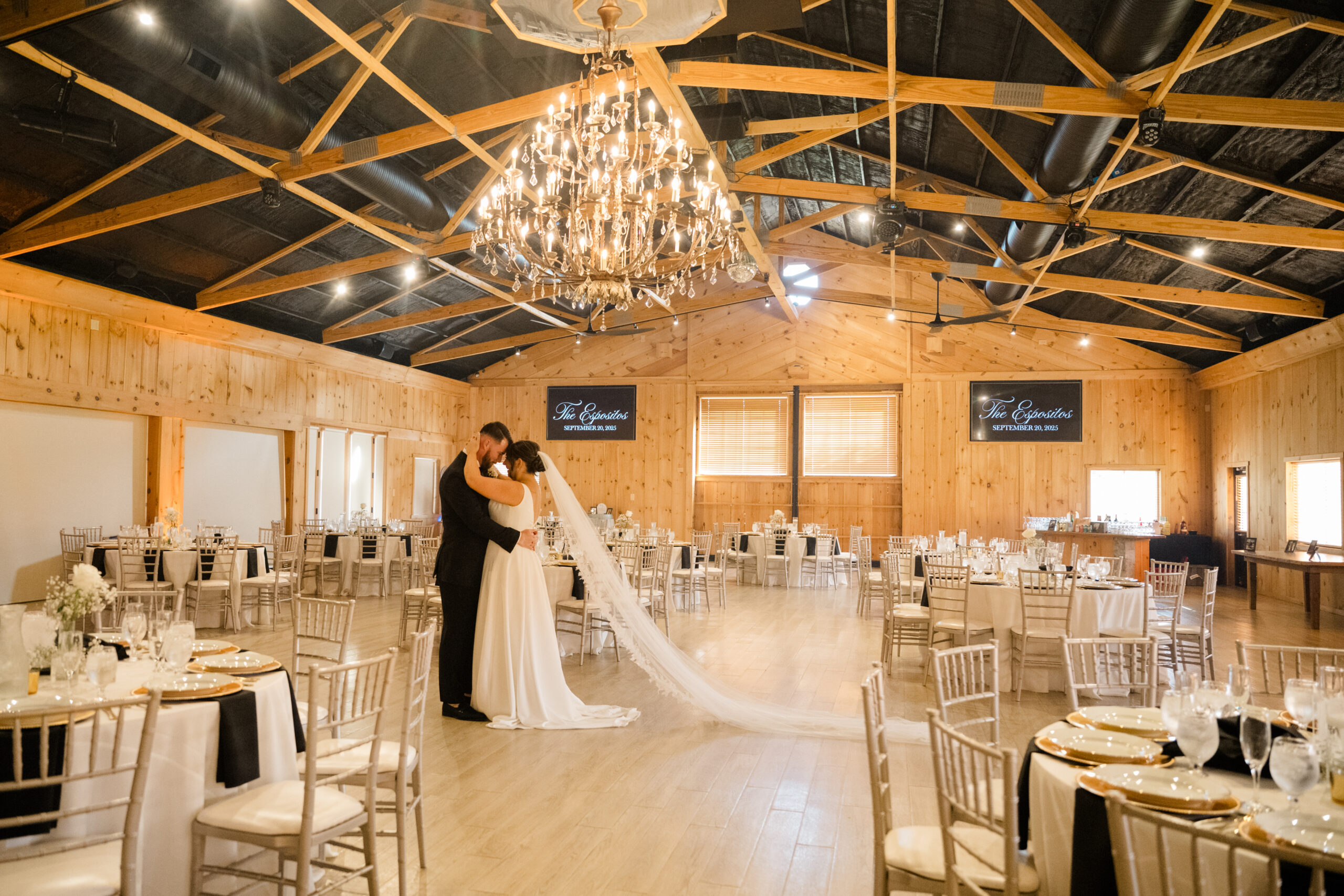 Bride and groom sharing a quiet moment together in the reception space before guests arrive at Gordon Springs